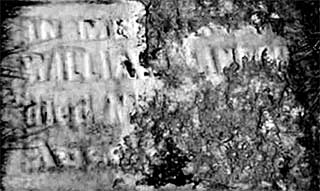 [Headstone detail]